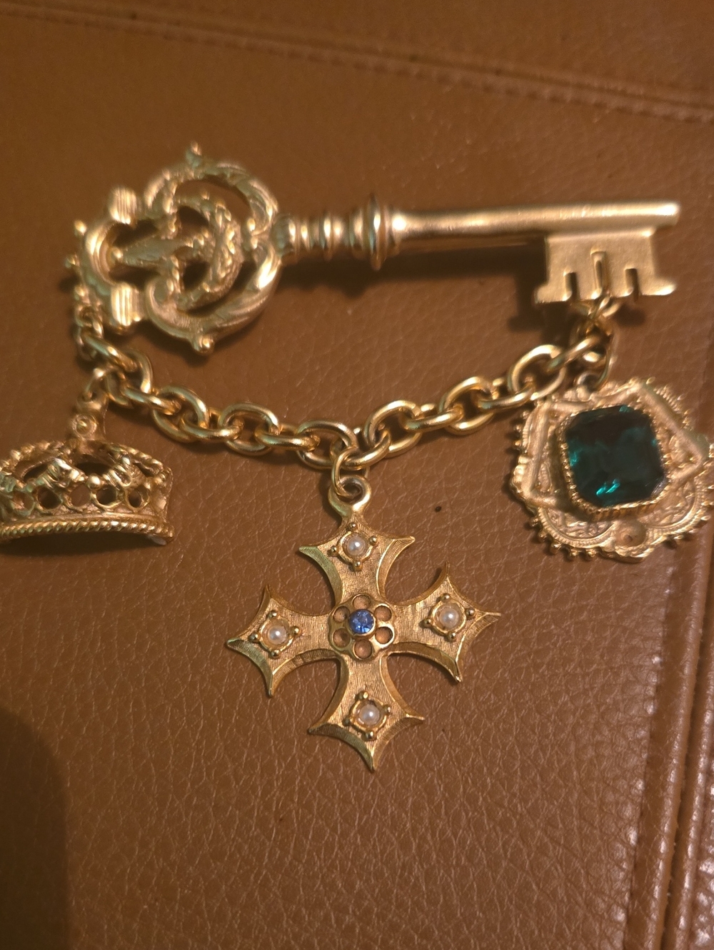 Gold-Tone Key & Charm Card Holder Accent with Green Gem and Cross Pendant